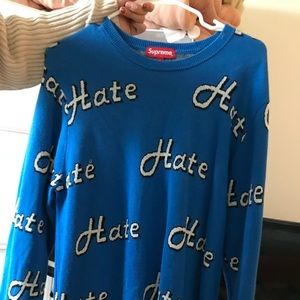 Supreme blue sweater.